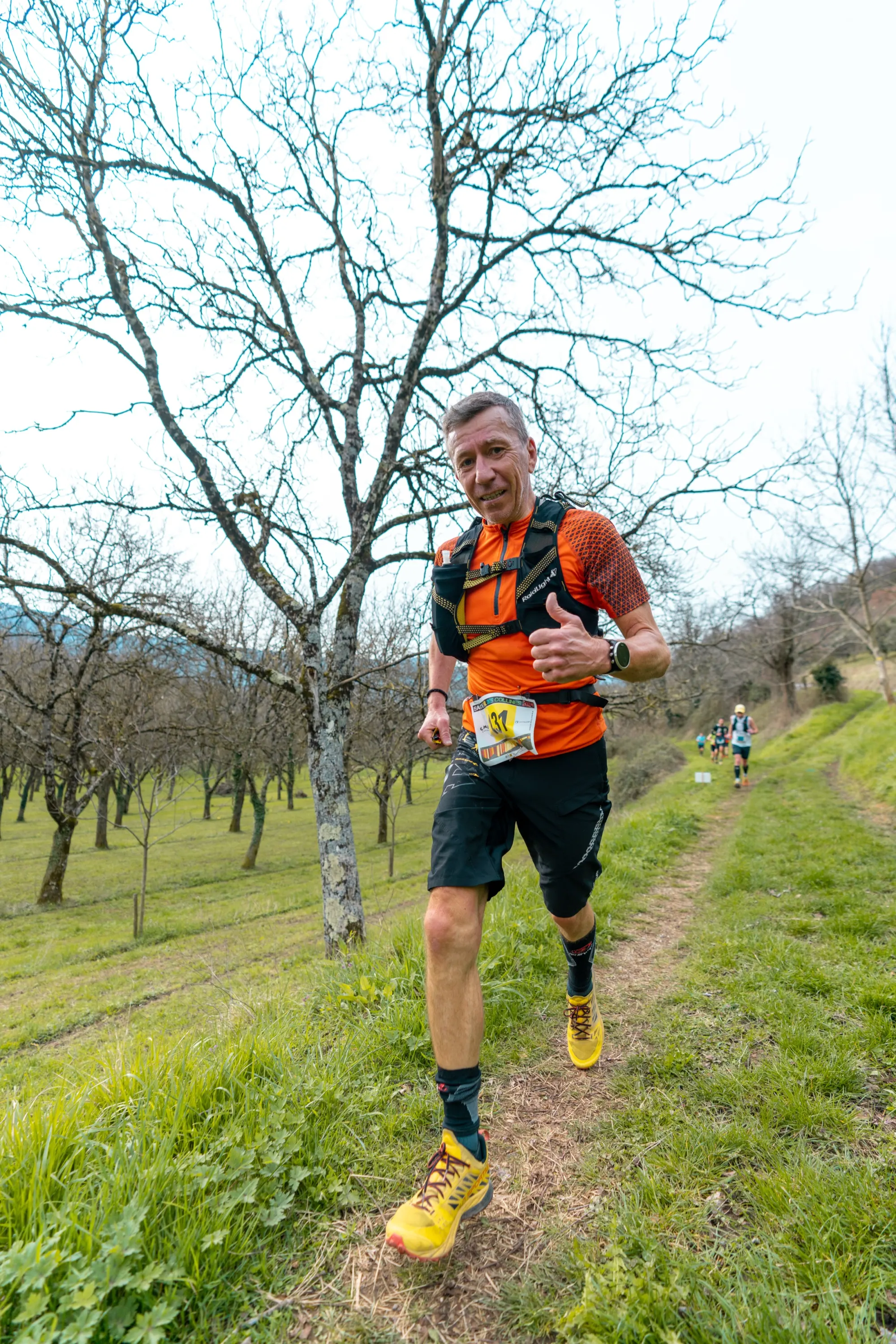 STC 2024, arrivée d'un coureur, ambiance podium
